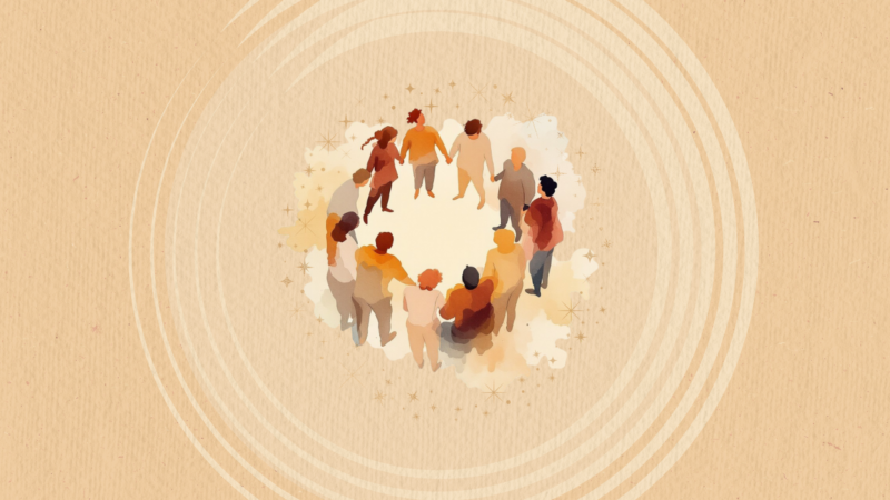 11 people standing in a circle holding hands